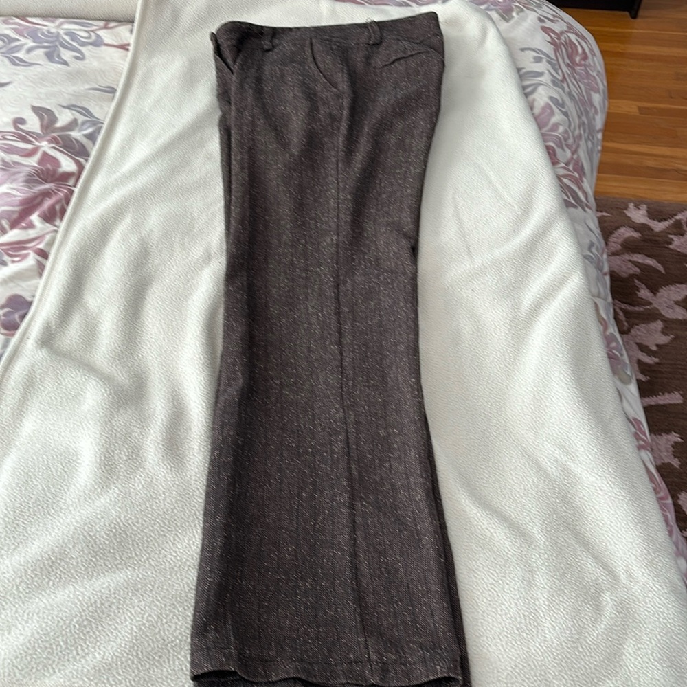 Brown with tiny tan specks, slim. Great for work. Italian import.